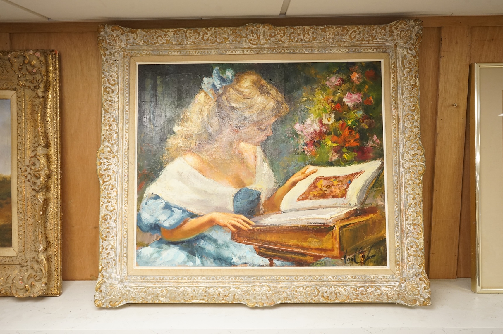 Robert Van Cleef (French, b.1914), Study of a girl reading beside flowers, signed, oil on canvas, 53 x 63cm, ornate frame